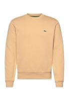 Sweatshirts Tops Sweat-shirts & Hoodies Sweat-shirts Beige Lacoste