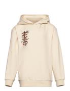 Nkmvugo Ls Nreg Sweat Wh Bru Tops Sweat-shirts & Hoodies Hoodies Cream...