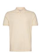 Regular-Fit Cotton Piqué Polo Shirt Tops Polos Short-sleeved Cream Man...